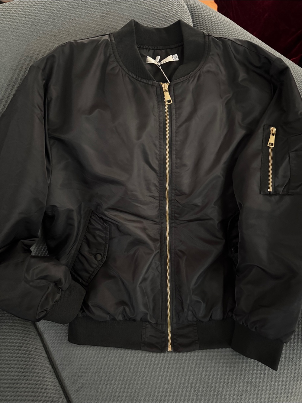 Black Unisex Bomber Jacket with Gold Zipper